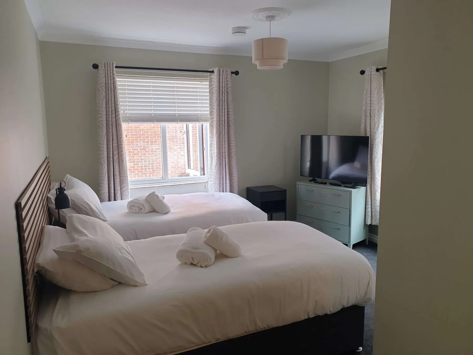 A twin room in the Nags Head Annex apartments beside the Roman Wall